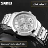 ساعت مچی عقربه‌ای کوارتز مردانه اسکمی مدل 9097SI به همراه دستبند