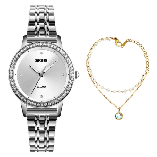 ساعت مچی عقربه ای زنانه اسکمی مدل 1311SI به همراه دستبند