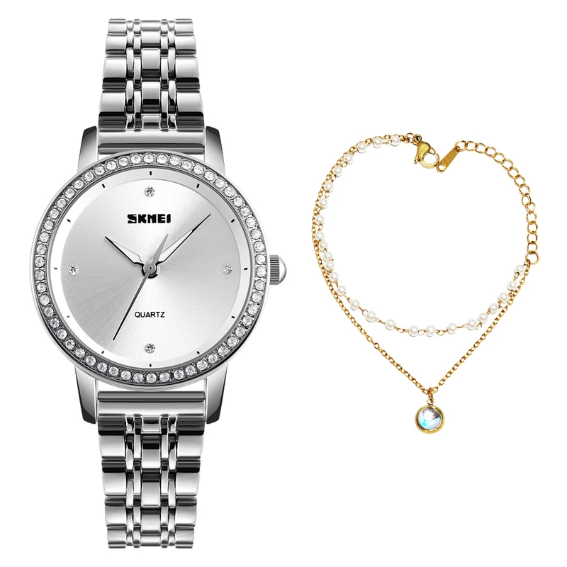 ساعت مچی عقربه ای زنانه اسکمی مدل 1311SI به همراه دستبند